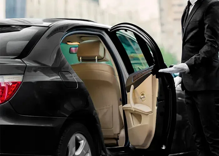 our driver helping passenger to come out of the car